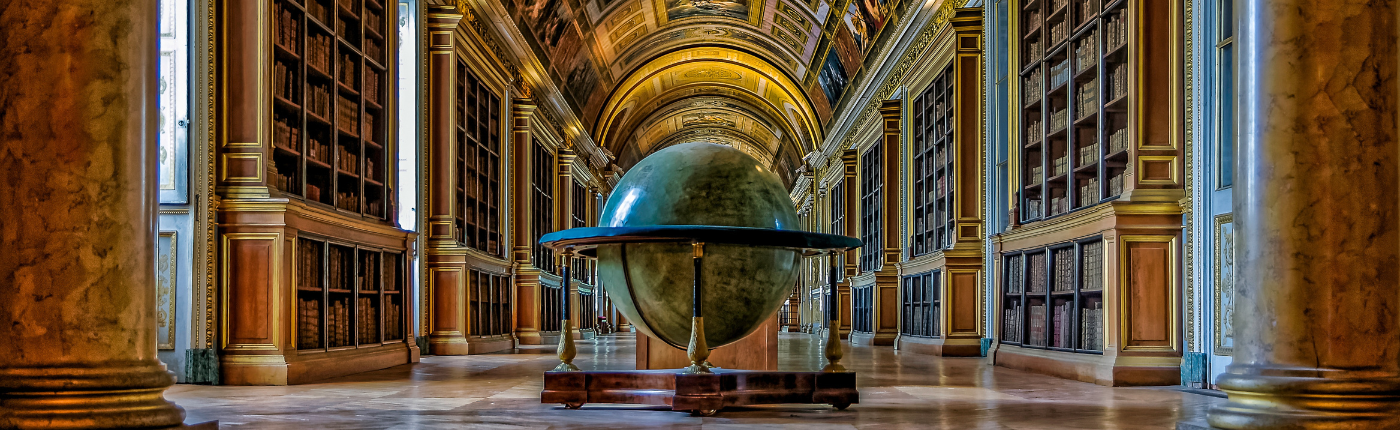 vintage library with a globe in the aisle